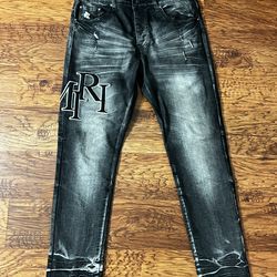 AMIRI Distressed Monogram Jeans