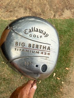 Assorted golf clubs