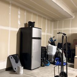 Mini fridge - 60$ pick up  (55” tall)