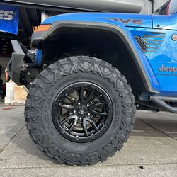fuel Rebel D679 17x9 5x5 matte black with 35x12.50R17 mud tires available  we finance 