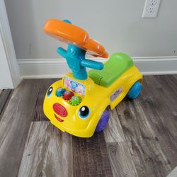 Toy Riding Musical Car (V-tech Sit To Stand Smart Cruiser)