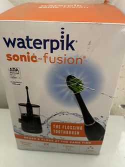 Brand new Waterpik Sonic-Fusion Flossing Toothbrush!!