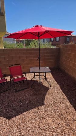 Picnic Table with an umbrella, and 4 Chairs