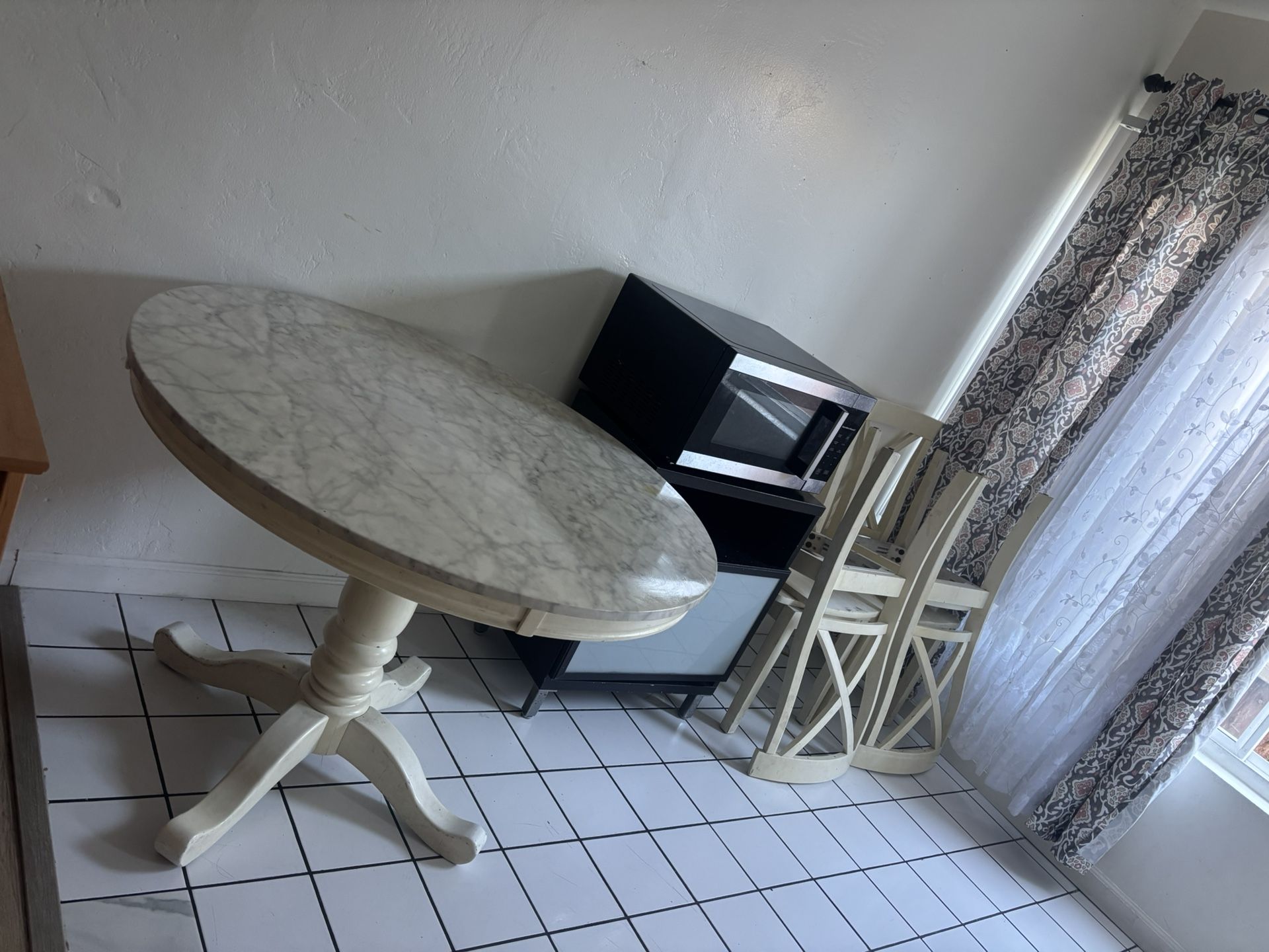Dining room table with four chairs