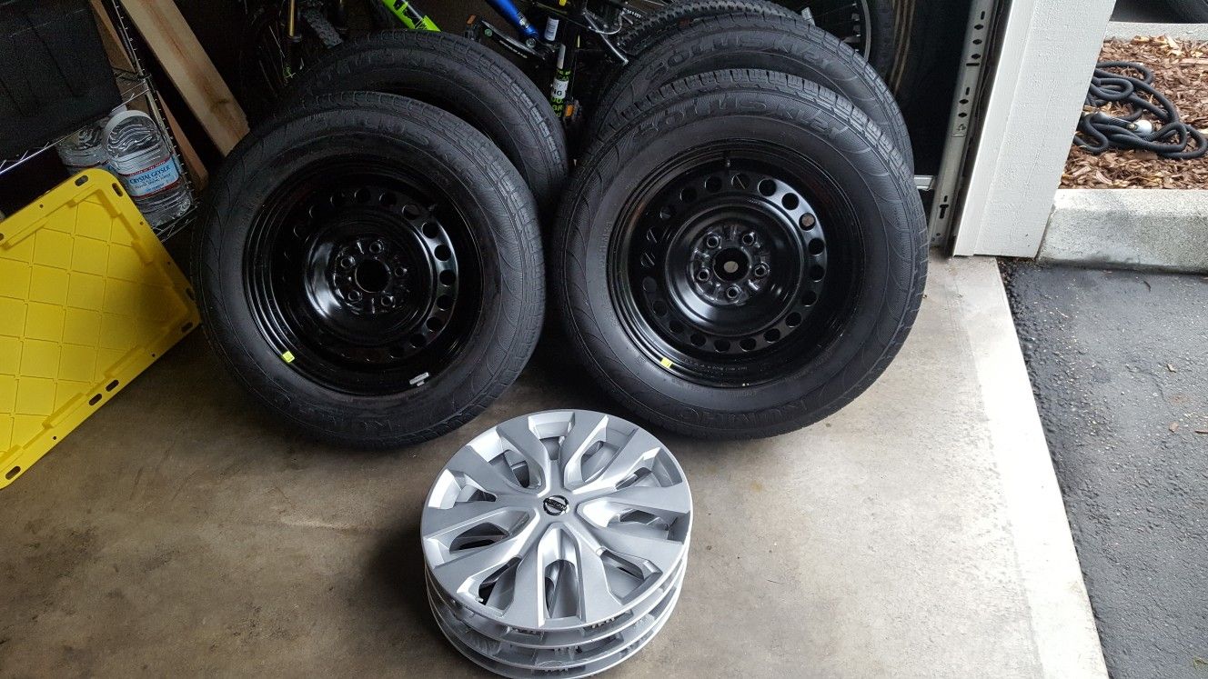 FULL Set of 4 225/65R tires and RIMS (17") from 2017 Nissan Rouge with hubcaps included!