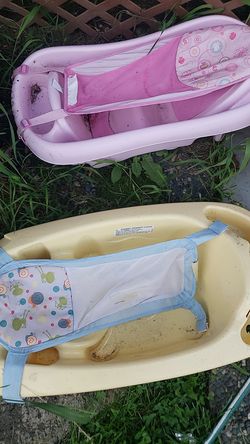 Boy and girl baths just got rained on cleaning out house to sale