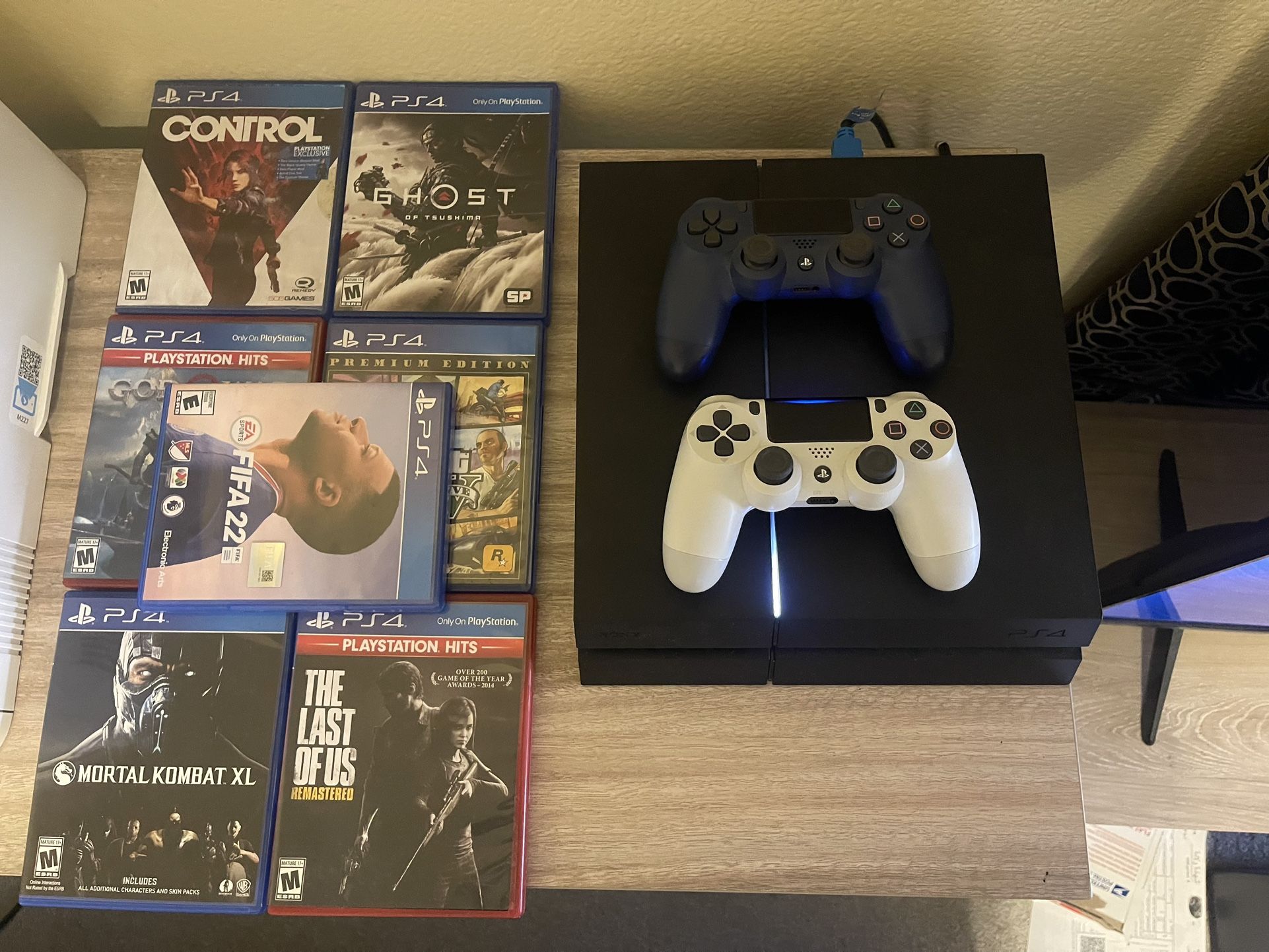 PS4 with 2 New Controller And 7 Games
