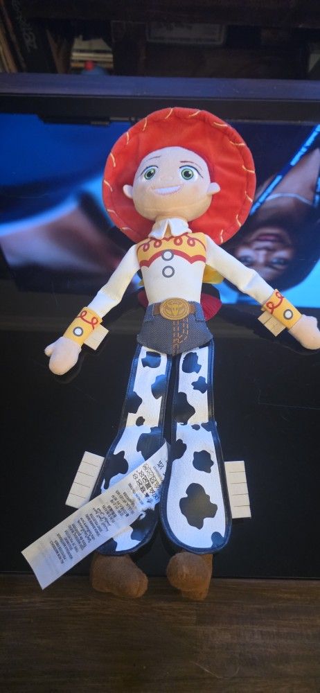 The Disney Pixar Toy Story 17" Jessie Plush Stuffed Cowgirl Doll is a collectible plush toy based on the character Jess from the Toy Story franchise.