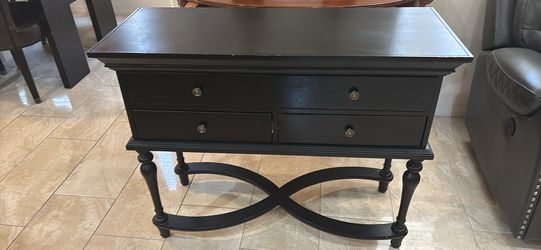 Beautiful black, and it could also be considered deep chocolate accent table