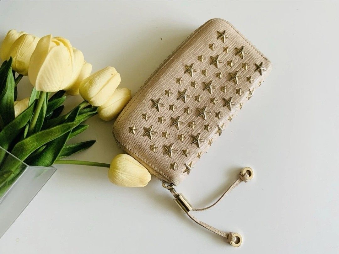 Jimmy Choo dusty pink leather Filipa Star Studded continental zip wallet is in very good preowned condition, nothing significant to note, made in Ital