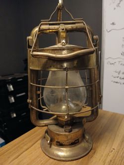 Lionstone Whiskey brass fireman hanging lantern decanter empty