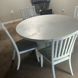 Solid Wood Table And Four Chairs