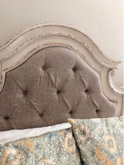 Queen upholstered bed