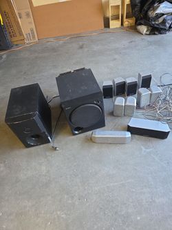 Home theater speakers and powered subwoofers
