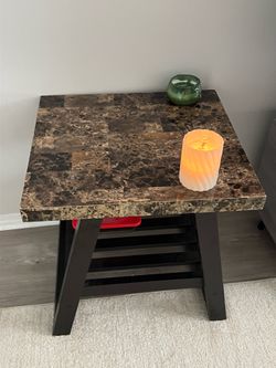 Faux marble top with dark wood/black base
