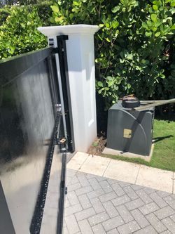 Electric gate shaking, dragging, or jamming? I fix chain, rollers, and tracks
