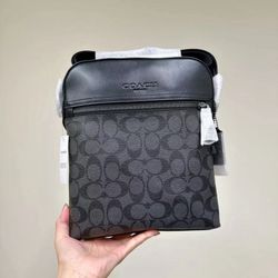 Men’s coach side bag brand new comes with tags an dust bag