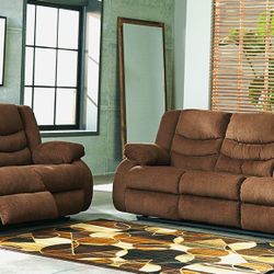 Ashley Rocking Tolen Sofa and Loveseat