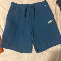 Blue Nike tech fleece shorts