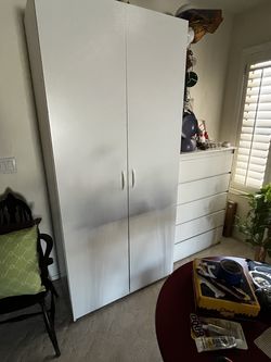 2 Tall White Storage Cabinets