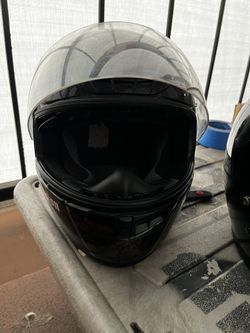 1motorcycle helmets, I believe the big one is small or med