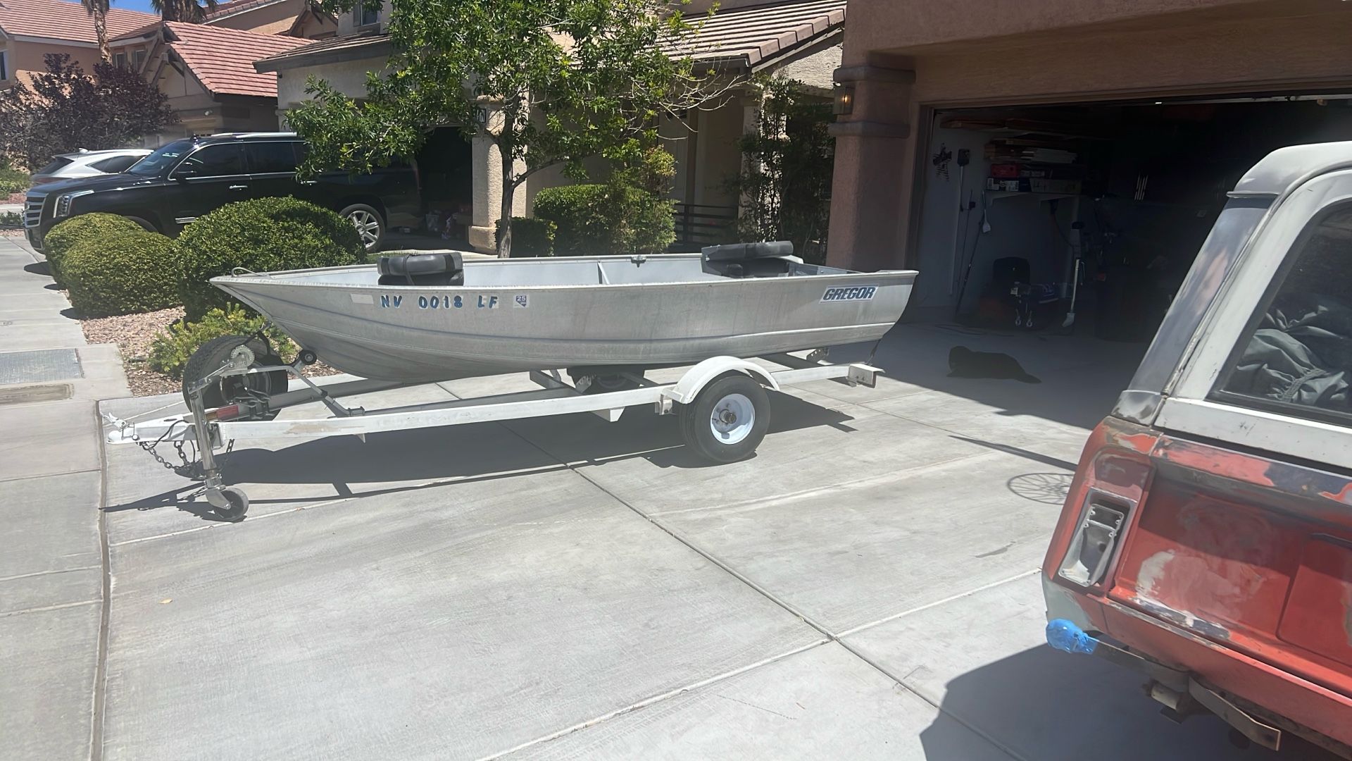 Gregor boat 2006 Zieman Trailer. New Minn Kota Trolling Motor And Battery.