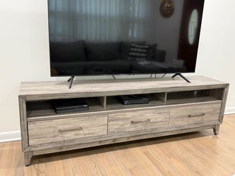 Gray Wood TV Stand with Drawers from Jordan's furniture