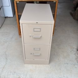 HON 2 Draw File Cabinet works perfect. Very good condition comes with hanging file holders and a bunch of hanging files in great condition