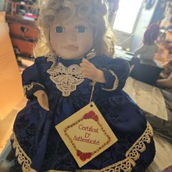 Collector's Choice Musical Moving Porcelain Doll