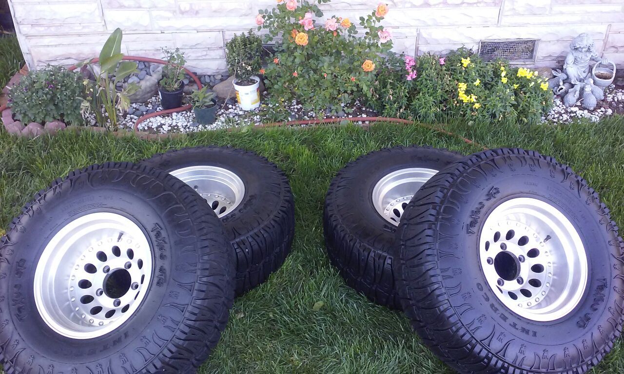 Super Swamper Tires and rims 33x12.50R15, TrXus STS Radial