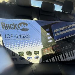 Keyboard with stand and headphones 