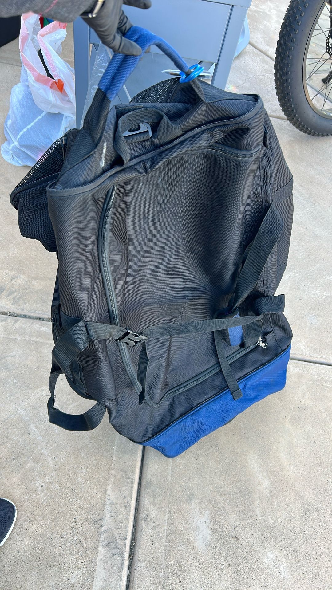 Large lightweight bag with wheels on it