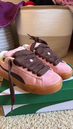 Pink puma platform shoes