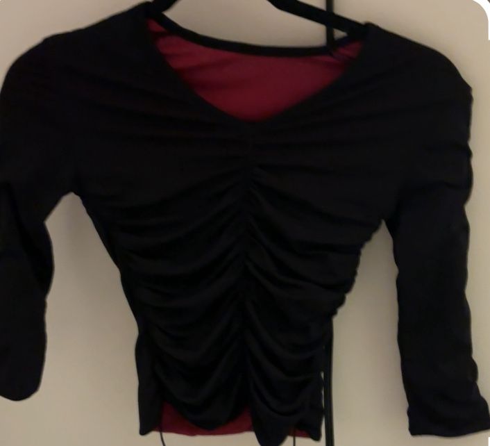 Gothic black and red long-sleeved ruched top.