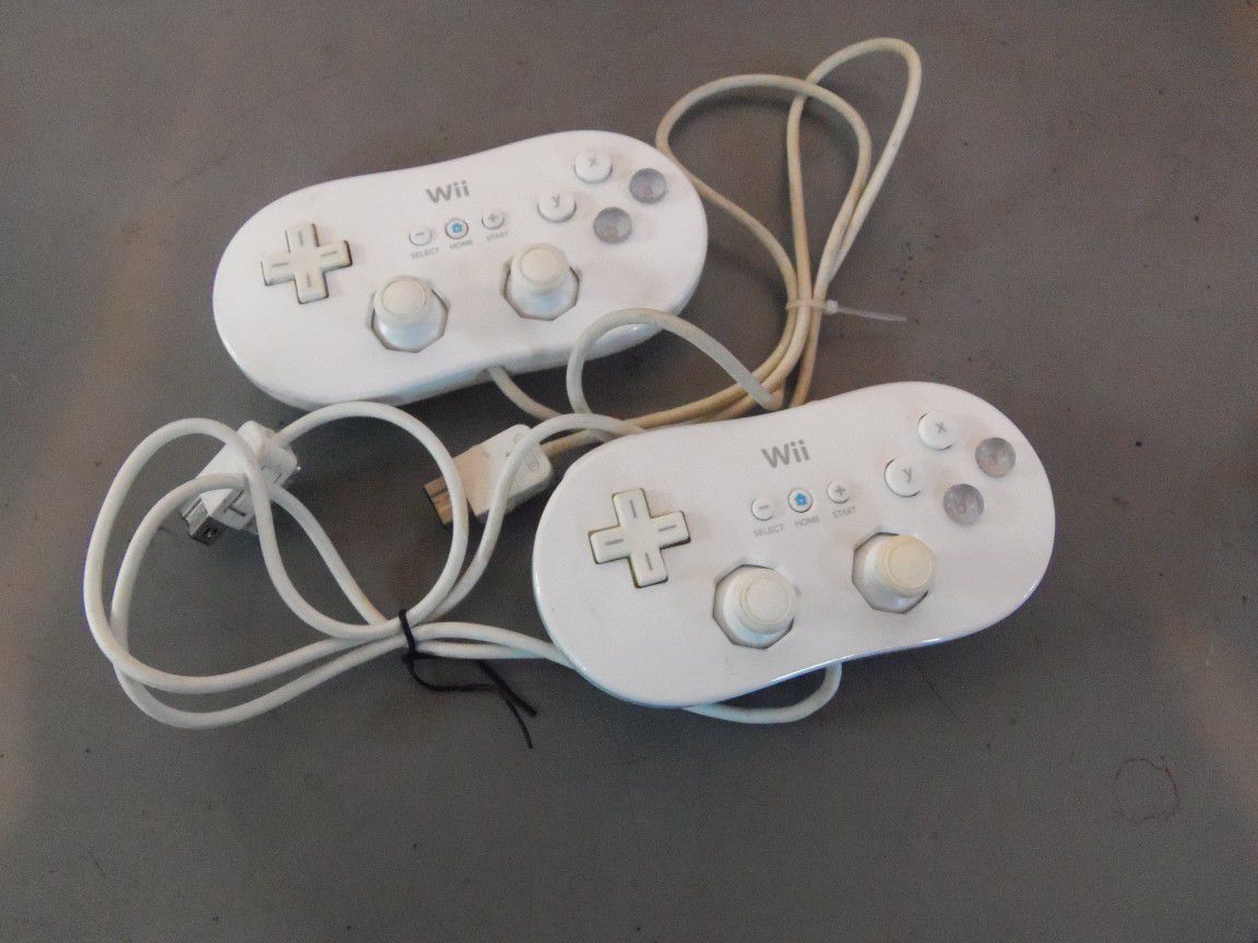 Pair of Official Nintendo Brand Wii OEM Clssic Controllers