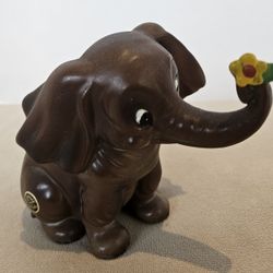 Josef Originals Elephant Sitting with Flower Figurine