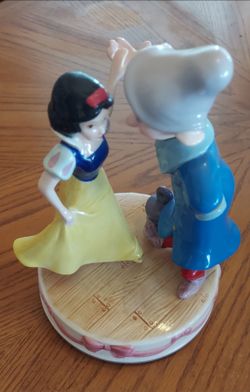 Snow White musical figures. Spins also.