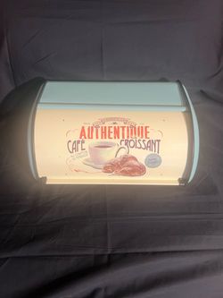 Vintage-style metal roll-top bread box