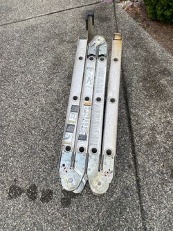 Moving sale- Warner foldable , expandable ladder - made of aluminum  , extends to 12 ft.