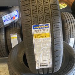 BRAND NEW SET OF GOODYEAR TIRES 205/65/15