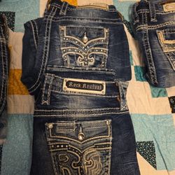 Rock Revival Straight Legged Mid Rise Jeans 