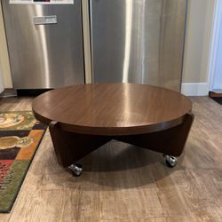 Coffee table or ottoman on casters