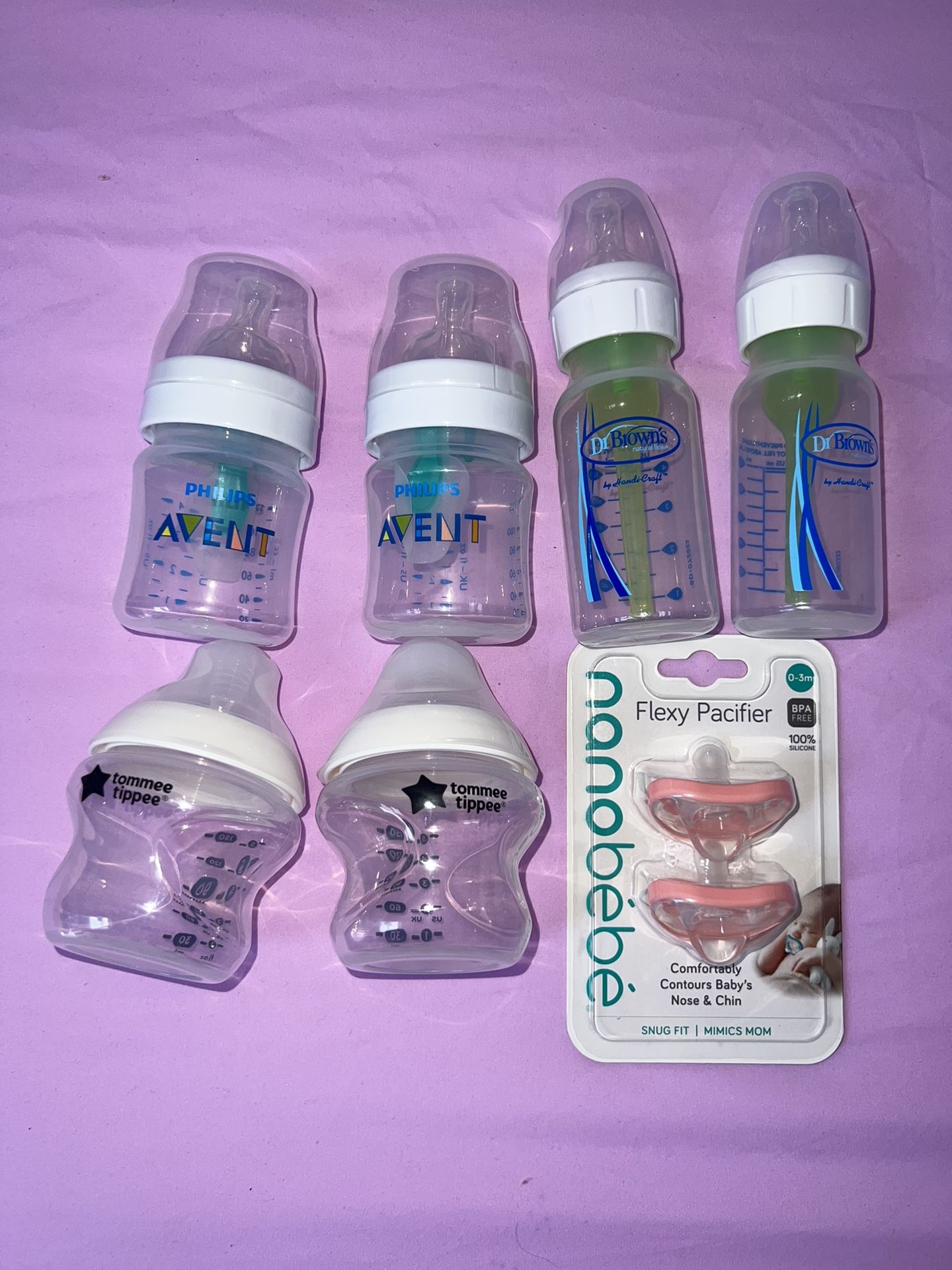 Set of Baby bottles & pacifers 