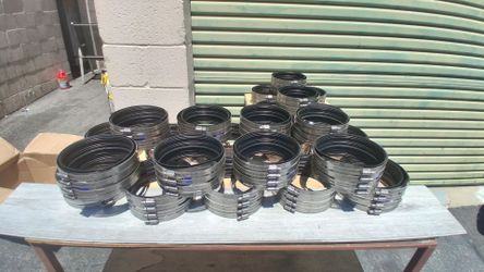 24 New Anaco heavy-duty 4-band no-hub couplings.