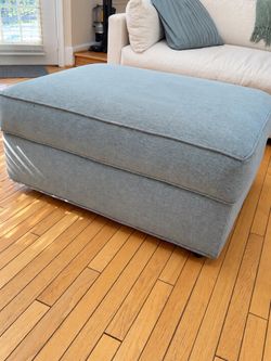 Large Upholstered Ottoman with Casters