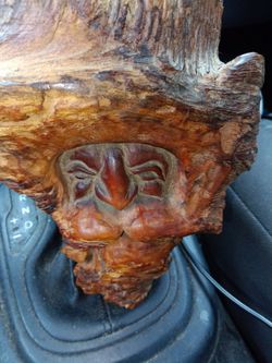 Very heavy hand carved looks like a wizard not sure or a old man it's initials in the back senator or something very nicely made
