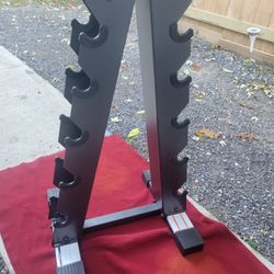 A-FRAME DUMBBELL RACK HOLDS 5 SETS.  BARLEY USED 
11525 S  HALSTED DUNKIN DONUTS/7111.S WESTERN WALGREENS 
45$ CASH ONLY AS IS 