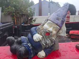 Vintage cast iron garden gnome the ..price is firm