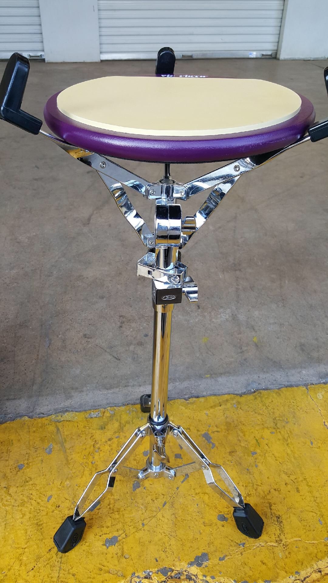 Snare drum stand with practice pad
