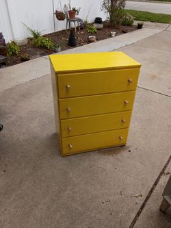 Yellow wood dresser/27x15.5x34 inches